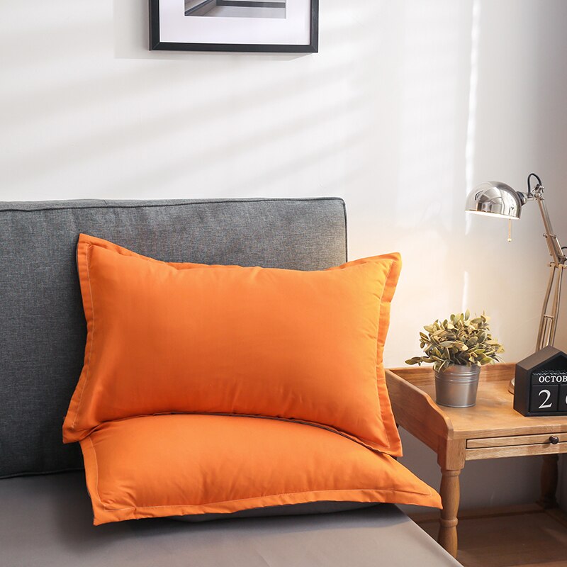 chambre moderne avec housse couette orange
